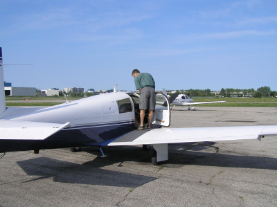 Pilot on Mooney Wing